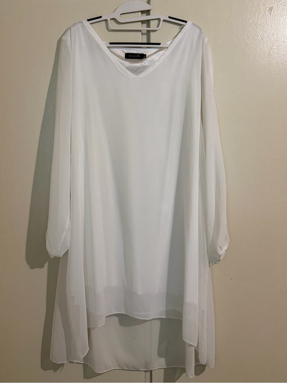 Never worn White pullover cover up. Soft n breezy poolside..or cruise